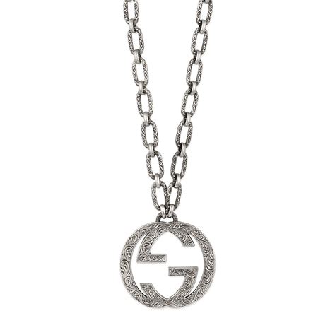 silver gucci lion pendant|gucci interlocking chain.